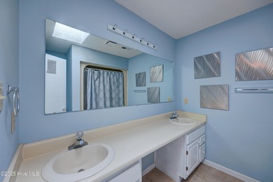 Nestled in one of Hampstead's most desirable neighborhoods, this on Belvedere Country Club in North Carolina - for sale on GolfHomes.com, golf home, golf lot