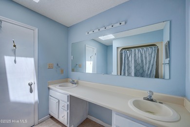 Nestled in one of Hampstead's most desirable neighborhoods, this on Belvedere Country Club in North Carolina - for sale on GolfHomes.com, golf home, golf lot