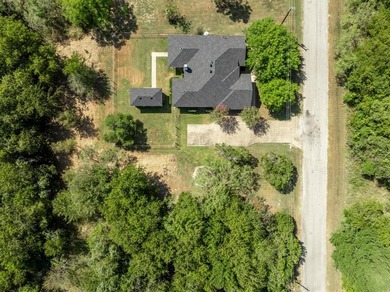Welcome home to this beautifully maintained brick residence on White Bluff Resort - New Course in Texas - for sale on GolfHomes.com, golf home, golf lot