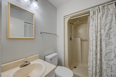 Nestled in one of Hampstead's most desirable neighborhoods, this on Belvedere Country Club in North Carolina - for sale on GolfHomes.com, golf home, golf lot