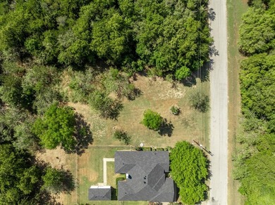 Welcome home to this beautifully maintained brick residence on White Bluff Resort - New Course in Texas - for sale on GolfHomes.com, golf home, golf lot