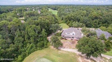 Luxurious custom built home located on the 1st hole in the on The Oaks Golf Club in Mississippi - for sale on GolfHomes.com, golf home, golf lot