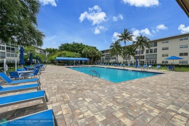 Luxury Floor Plan Remodeled: A Property of Distinction. This on Wynmoor Golf Course in Florida - for sale on GolfHomes.com, golf home, golf lot