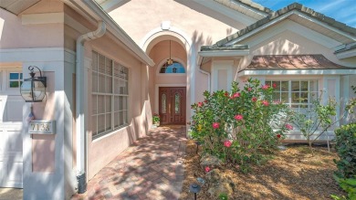 Welcome to this beautifully maintained three-bedroom on University Park Country Club in Florida - for sale on GolfHomes.com, golf home, golf lot