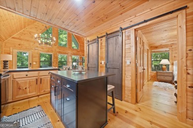 Nestled atop a gentle hill and surrounded by graceful Hemlocks on White Path Golf Club in Georgia - for sale on GolfHomes.com, golf home, golf lot