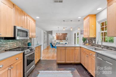 Discover this charming Black Mountain cottage, ideally situated on Black Mountain Golf Course in North Carolina - for sale on GolfHomes.com, golf home, golf lot