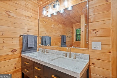 Nestled atop a gentle hill and surrounded by graceful Hemlocks on White Path Golf Club in Georgia - for sale on GolfHomes.com, golf home, golf lot
