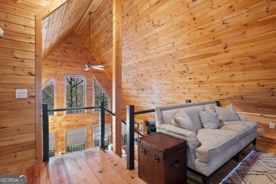 Nestled atop a gentle hill and surrounded by graceful Hemlocks on White Path Golf Club in Georgia - for sale on GolfHomes.com, golf home, golf lot