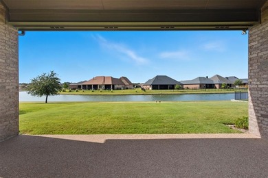 This stunning Pecan Plantation home offers peaceful views of a on Pecan Plantation Country Club in Texas - for sale on GolfHomes.com, golf home, golf lot