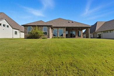 This stunning Pecan Plantation home offers peaceful views of a on Pecan Plantation Country Club in Texas - for sale on GolfHomes.com, golf home, golf lot