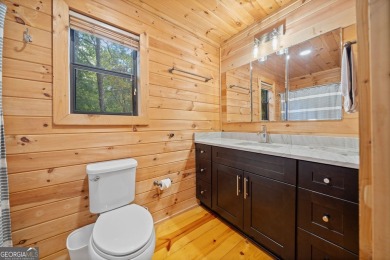 Nestled atop a gentle hill and surrounded by graceful Hemlocks on White Path Golf Club in Georgia - for sale on GolfHomes.com, golf home, golf lot