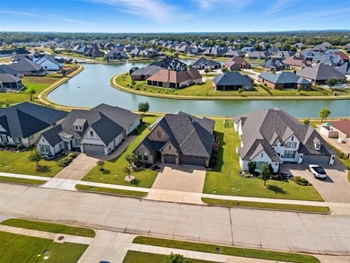 This stunning Pecan Plantation home offers peaceful views of a on Pecan Plantation Country Club in Texas - for sale on GolfHomes.com, golf home, golf lot