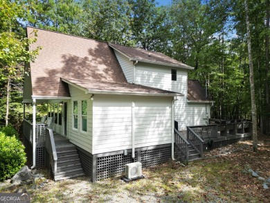 Nestled atop a gentle hill and surrounded by graceful Hemlocks on White Path Golf Club in Georgia - for sale on GolfHomes.com, golf home, golf lot