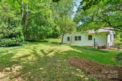 Discover this charming Black Mountain cottage, ideally situated on Black Mountain Golf Course in North Carolina - for sale on GolfHomes.com, golf home, golf lot