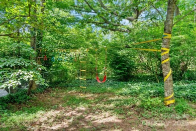 Discover this charming Black Mountain cottage, ideally situated on Black Mountain Golf Course in North Carolina - for sale on GolfHomes.com, golf home, golf lot
