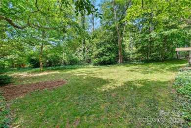 Discover this charming Black Mountain cottage, ideally situated on Black Mountain Golf Course in North Carolina - for sale on GolfHomes.com, golf home, golf lot