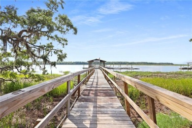Welcome home to this coastal gem, just approximately a 75-yard on Sapelo Hammock Golf Club in Georgia - for sale on GolfHomes.com, golf home, golf lot