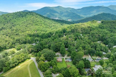 Discover this charming Black Mountain cottage, ideally situated on Black Mountain Golf Course in North Carolina - for sale on GolfHomes.com, golf home, golf lot