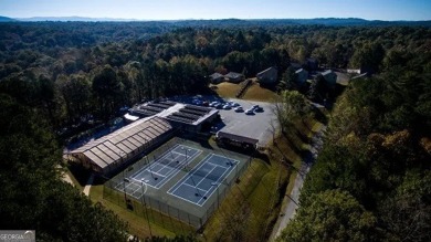 Nestled atop a gentle hill and surrounded by graceful Hemlocks on White Path Golf Club in Georgia - for sale on GolfHomes.com, golf home, golf lot