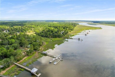 Welcome home to this coastal gem, just approximately a 75-yard on Sapelo Hammock Golf Club in Georgia - for sale on GolfHomes.com, golf home, golf lot