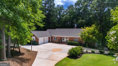 Stunning lakefront home offering an exceptional blend of luxury on Highland Country Club in Georgia - for sale on GolfHomes.com, golf home, golf lot