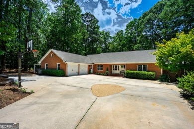 Stunning lakefront home offering an exceptional blend of luxury on Highland Country Club in Georgia - for sale on GolfHomes.com, golf home, golf lot