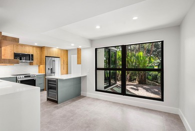 Exquisitely renovated 3BR/2BA first-floor condo with stunning on Quail Ridge Golf Course and Country Club in Florida - for sale on GolfHomes.com, golf home, golf lot