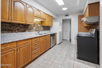 Looking for a HUGE lot? Welcome to this upgraded 2-bedroom on Sun City Lakes West and East in Arizona - for sale on GolfHomes.com, golf home, golf lot