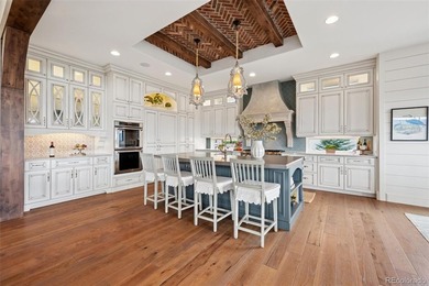 Please watch the video tour! This award-winning French Chateau on The Club At Flying Horse in Colorado - for sale on GolfHomes.com, golf home, golf lot