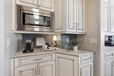 Please watch the video tour! This award-winning French Chateau on The Club At Flying Horse in Colorado - for sale on GolfHomes.com, golf home, golf lot