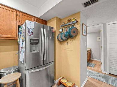 Gorgeous Hammock Pines Village second floor condo with one on Countryside Country Club in Florida - for sale on GolfHomes.com, golf home, golf lot