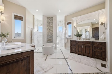 Please watch the video tour! This award-winning French Chateau on The Club At Flying Horse in Colorado - for sale on GolfHomes.com, golf home, golf lot