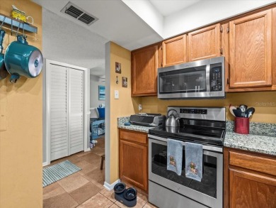 Gorgeous Hammock Pines Village second floor condo with one on Countryside Country Club in Florida - for sale on GolfHomes.com, golf home, golf lot