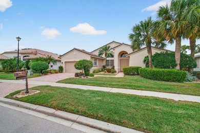 Experience over 2,400 sq ft of stylish, comfortable living with on Westchester Golf and Country Club in Florida - for sale on GolfHomes.com, golf home, golf lot