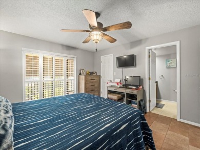 Gorgeous Hammock Pines Village second floor condo with one on Countryside Country Club in Florida - for sale on GolfHomes.com, golf home, golf lot