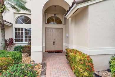 Experience over 2,400 sq ft of stylish, comfortable living with on Westchester Golf and Country Club in Florida - for sale on GolfHomes.com, golf home, golf lot