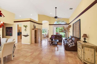 Experience over 2,400 sq ft of stylish, comfortable living with on Westchester Golf and Country Club in Florida - for sale on GolfHomes.com, golf home, golf lot