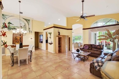 Experience over 2,400 sq ft of stylish, comfortable living with on Westchester Golf and Country Club in Florida - for sale on GolfHomes.com, golf home, golf lot