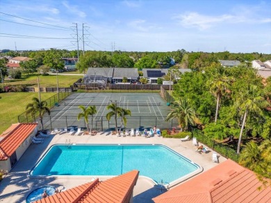 Gorgeous Hammock Pines Village second floor condo with one on Countryside Country Club in Florida - for sale on GolfHomes.com, golf home, golf lot