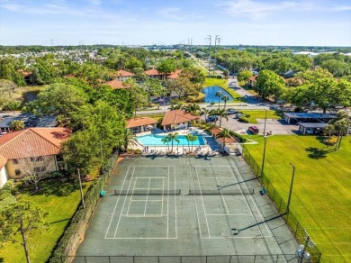 Gorgeous Hammock Pines Village second floor condo with one on Countryside Country Club in Florida - for sale on GolfHomes.com, golf home, golf lot