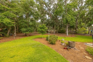 Tucked within the gated community of Oak Grove Island, 189 on Oak Grove Island Golf and Country Club in Georgia - for sale on GolfHomes.com, golf home, golf lot