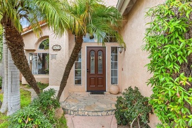 Perched on a quiet street in Vista's desirable Shadowridge area on Shadowridge Country Club in California - for sale on GolfHomes.com, golf home, golf lot