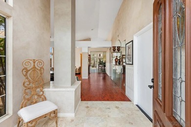 Perched on a quiet street in Vista's desirable Shadowridge area on Shadowridge Country Club in California - for sale on GolfHomes.com, golf home, golf lot