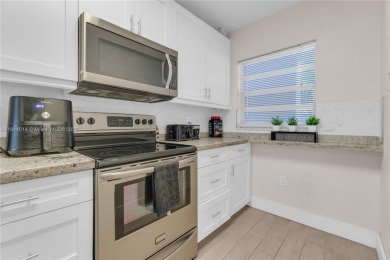 PRICE DROP !!! Here is your chance to live in a waterfront on Pine Island Ridge Country Club in Florida - for sale on GolfHomes.com, golf home, golf lot