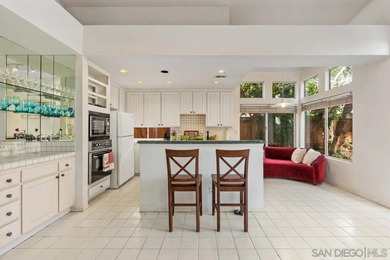 Perched on a quiet street in Vista's desirable Shadowridge area on Shadowridge Country Club in California - for sale on GolfHomes.com, golf home, golf lot