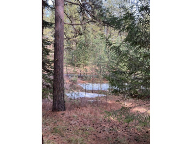 Price is right! Large wooded parcel in prestigious MeadowCreek on Meadowcreek Golf Resort in Idaho - for sale on GolfHomes.com, golf home, golf lot