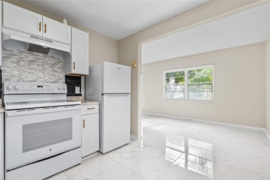 FOR SALE - 2/2 CORNER UNIT - LOW FLOOR - UPDATED KITCHEN (JUNE on Flamingo Lakes Country Club in Florida - for sale on GolfHomes.com, golf home, golf lot