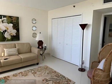 Stunningly renovated 8th floor *F* unit in coveted Building 114 on Palm-Aire Country Club and Resort - Palms in Florida - for sale on GolfHomes.com, golf home, golf lot