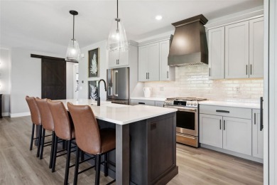 This Hodge Construction built home overlooks the scenic on Saddleback Ridge Golf Course in Iowa - for sale on GolfHomes.com, golf home, golf lot