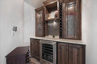 Exquisite home on the beautiful Tascosa Golf Course between on Tascosa Country Club in Texas - for sale on GolfHomes.com, golf home, golf lot
